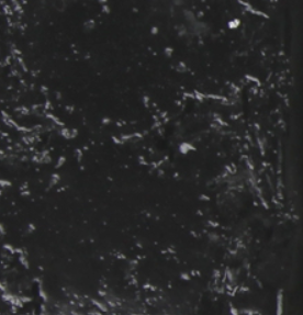 Close-up of a textured black surface